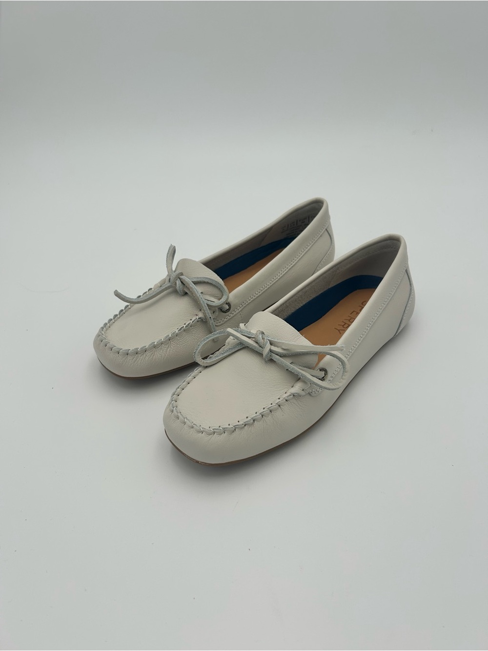 Sperry Cream Bow Round Toe Boat Shoes